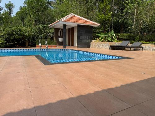 مسبح, Dhanagiri Homestay Wayanad in بوزوثانا