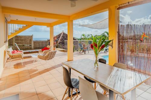 Bas de villa spacieux, proche plages et centre – khách sạn tại Schlcher