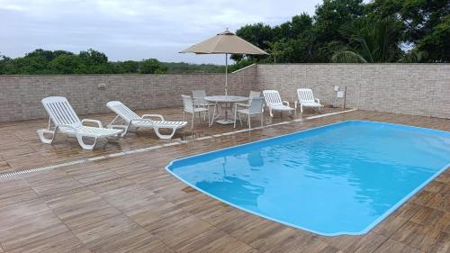 Peldbaseins, Casa com piscina e churrasqueira na Praia Seca in Praia Seca