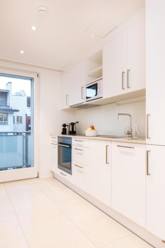Kitchen, City Stay Furnished Apartments - Lindenstrasse near Parkanlage Zuerihorn