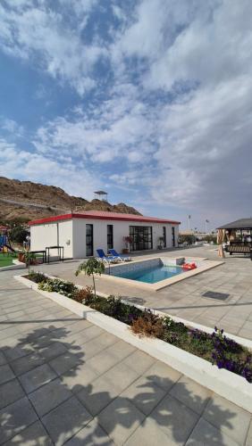 منتجع حتا الضخم - Hatta Mega Resort in Sinadil