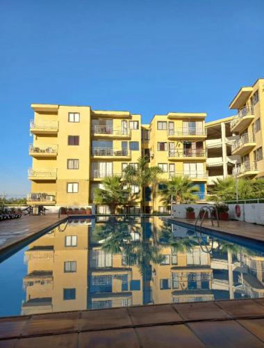 Apto familiar con piscina cerca a la playa