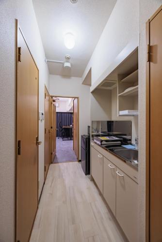 Kitchen, Work Friendly Room 3 min to Station Simmons Bed WiFi and Desk in Nagoya