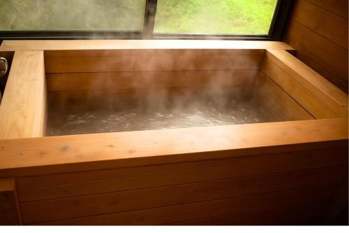 Kurokawa Onsen Cottage D 貸別荘 黒川温泉D – khách sạn tại Akababa