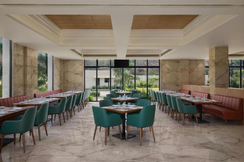 Restaurant, The Fern Fayms Resort Naigaon, Series by Marriott in Vasai