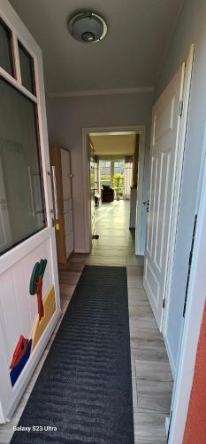Lối vào, Ferienhaus-Windflüchter Hirtenweg 3B (Ferienhaus-Windfluchter Hirtenweg 3B) in Zingst