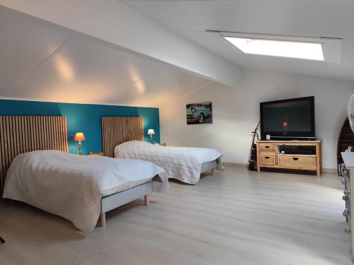 Koplietošanas atpūtas telpa ar TV, Gîte de la Pare (Gite de la Pare) in Oluaksa