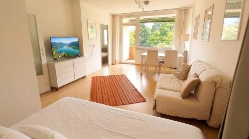 CHRISTOPH Haus KMB Seeappartement am Ossiacher See mit direktem Seezugang und Hallenbad
