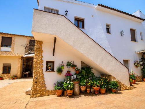 Casa Rural la Quinteria de Sancho piscina para tres apartamentos in Argamasilla De Alba