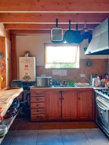مطبخ, Hostel Casa de Montaña (Hostel Casa de Montana) in سانمارتن دلوس اندير
