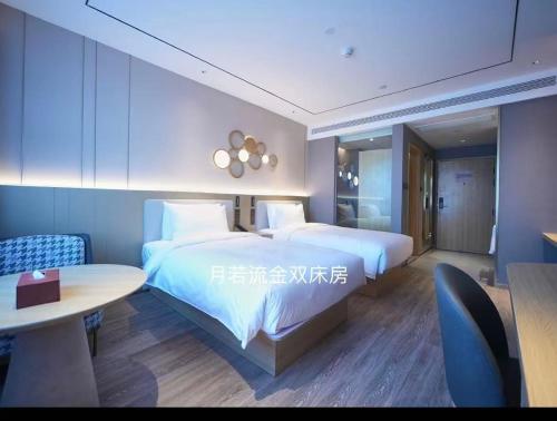 Orange Hotel Tianjin Huayuan - image 3