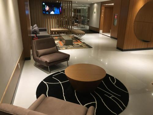 Shared lounge/TV area, Petit Rio Hotel in Catete