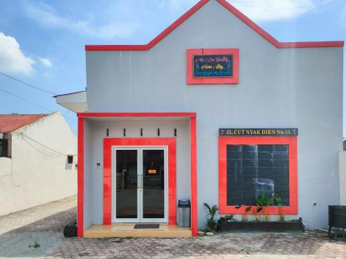 Sissepääs, New Era Family Homestay Binjai Mitra RedDoorz in Binjai