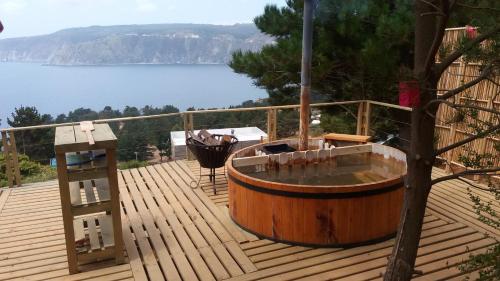Atvērtā tipa vanna, Cabanas & SPA Carilafquen in Laguna Verde