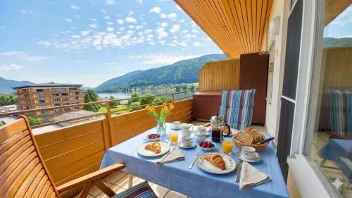 LENA Haus KMB Seeappartement am Ossiacher See mit direktem Seezugang und Hallenbad in Tschöran, Österreich