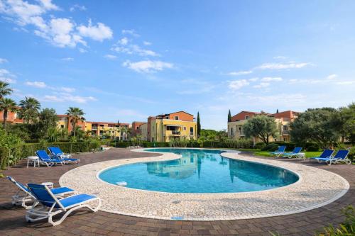 Villaggio Parco Laguna - Appartamento con Piscina e Posto Barca