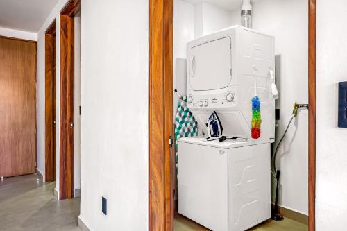2nd-floor condo with heated outdoor pool grills balcony W/D AC - image 2