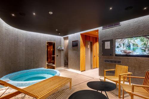 Bañera de hidromasaje, Dunetton - self check-in hotel in Klaipeda City Center