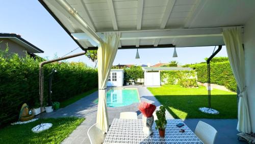 Villa con piscina piano unico - PESCA in Isola Albarella