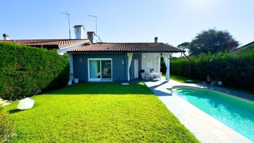 Villa con piscina piano unico - PESCA in Isola Albarella