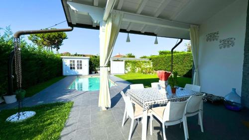 Villa con piscina piano unico - PESCA in Isola Albarella