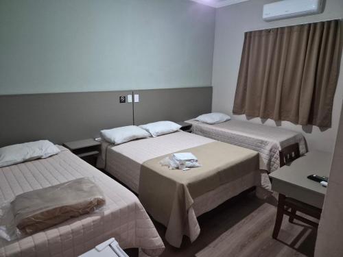 1 double bed, 2 twin beds