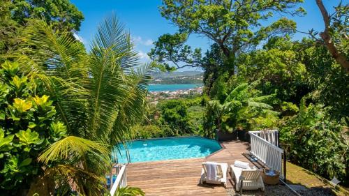 Douceur de Fèves - T2 de Charme avec Piscine et vue mer à la Trinité - Location saisonnière - La Trinité