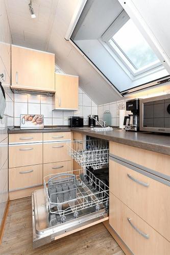 Fewo Mohnblume, Familienfreundliche Wohnung mit Außenspielanlage im Grünen (Fewo Mohnblume, Familienfreundliche Wohnung mit Außenspielanlage im Grunen) in Utarp