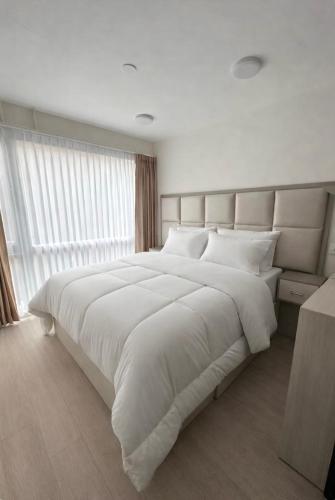 Elegant 1-Bedroom Apartment with Coworking Space