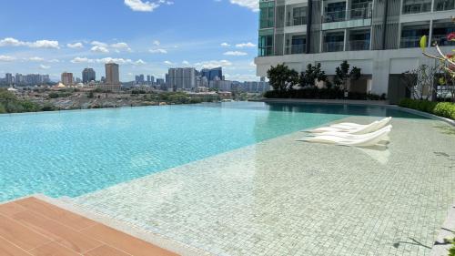 #DT1 Cozy Dorsett Suite (1-4 Pax) + Parking