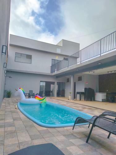 สระว่ายน้ำ, Maktub Casa e Área de Lazer para Temporada em Delfinópolis MG (Maktub Casa e Area de Lazer para Temporada em Delfinopolis MG) in เดลฟิโนโปลิส