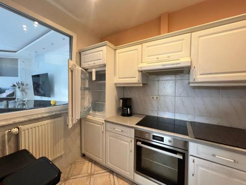 virtuve, Große Terrassenwohnung mit Seeblick in Stechlin