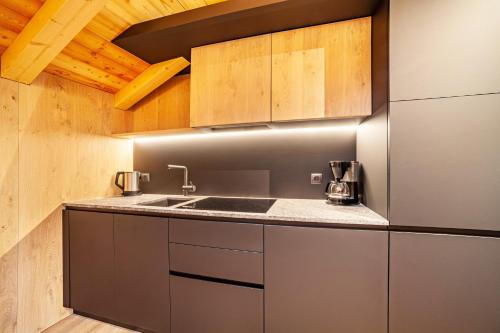 virtuve, Huetterhof Apartement Herbischt in Caines