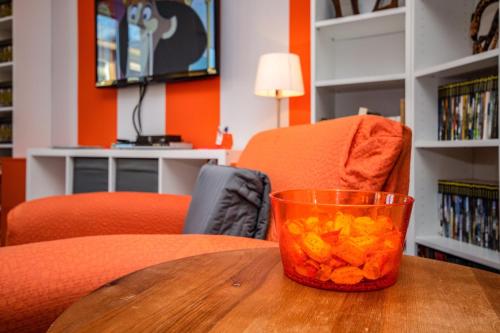 Orange Apartment - Tap to explore photos