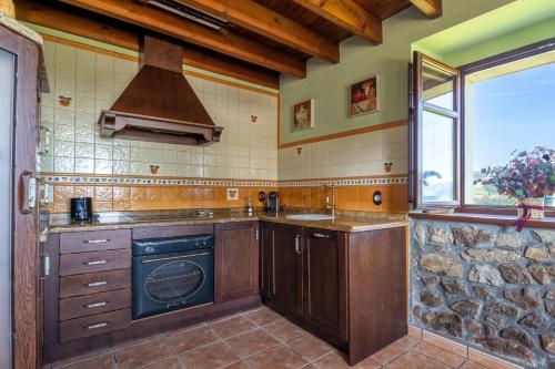 Kitchen, Paz y Tranquilidad in Pilona