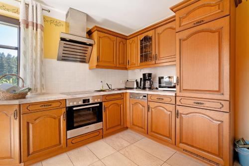 Kitchen, Ferienhaus Pohlbergblick Schindelba in Grossruckerswalde