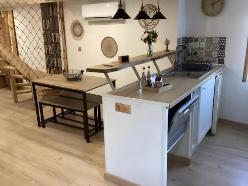 廚房, Appartement de charme Saint-Romain in 聖昂泰姆