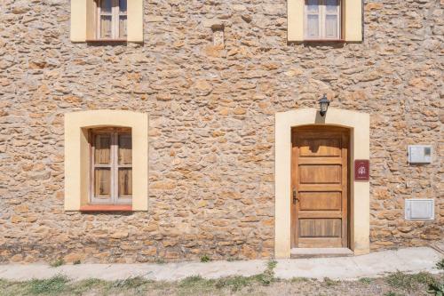 A szálláshely kívülről, Antiga escola de Molinell in Culla