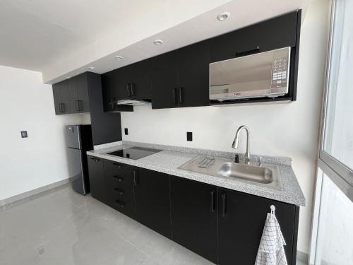 Bonito espacio de 1 habitacion con terraza privada en Casa Jacarandas in San José del Bajío