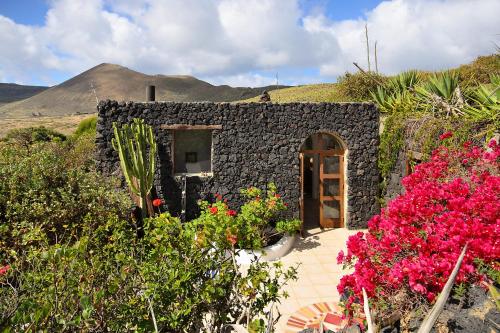 La Bodega - House on volcano with a piano, Haría