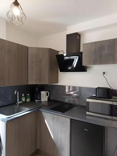 Konyha, Logement spacieux centre Joigny C5 in Joigny