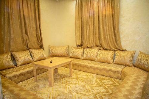 Koplietošanas atpūtas telpa ar TV, Laayoune Prestige House in Akhfennirr