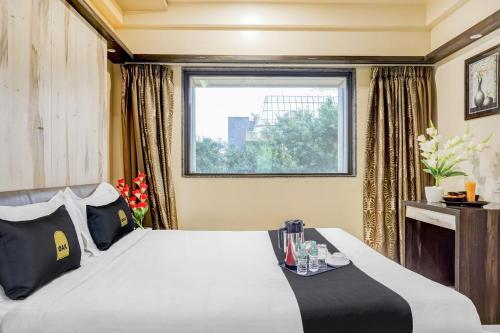 Super Townhouse OAK Regal Inn Near Sant Tukaram Nagar Metro Station