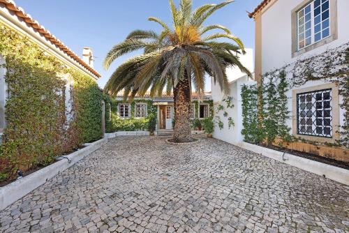 ทัศนียภาพภายนอกโรงแรม, Liberal Wing Villa in เปนินา