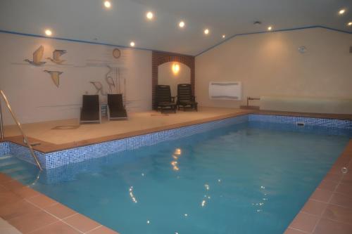 Viesnīcas āriene, Ferienhaus Auszeit am See in Walchum