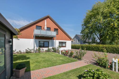 Фасада на хотела, Ferienwohnung Mühlenweide (Ferienwohnung Muhlenweide) in Wesselburen