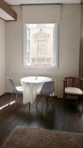 Habitación con balcón con vista al corazón de la ciudad