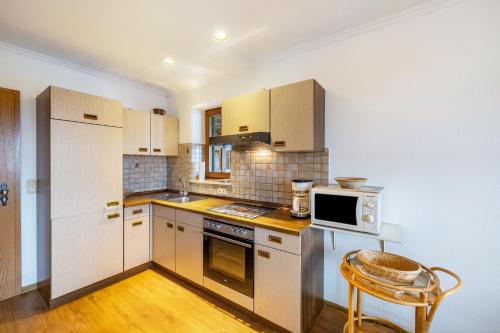 virtuve, Landhaus Kauderer - Wohnung 2 in Waging Am See