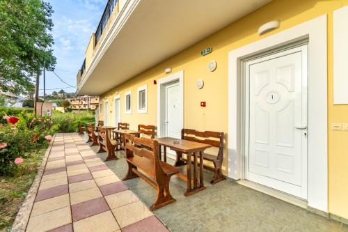 Kosmos Hotel St3 in Agios Stefanos - Tap to explore photos