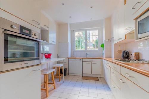 кухня, Appartement 90m2 Sur Jardin Clos in Сан-Клюд